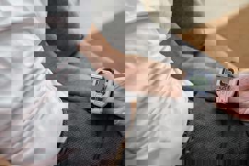 Wrist monitor on patient. 