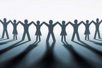 paperchain of people holding hands in a line