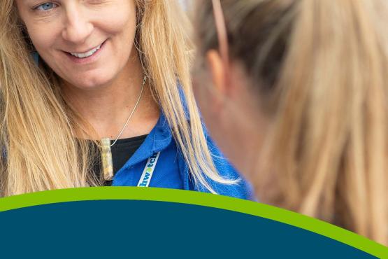 Front page cover for Healthwatch Halton Annual Report. Image of Healthwatch female staff member smiling. Text reads, ‘Together we’re making health and social care better Annual Report 2022 - 2023